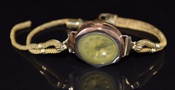 Unnamed 9ct gold ladies wristwatch with blued hands, Arabic numerals, gold dial and unsigned