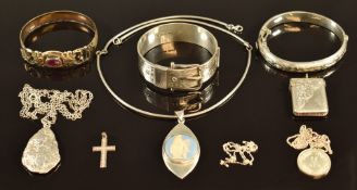A collection of silver jewellery including buckle bangle, engraved bangle, chains, pendants,