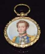 Victorian painted ivory miniature depicting a young gentleman wearing medals, in pinchbeck pendant