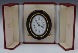 Must de-Cartier pendulette travel alarm clock, with easel back, height 9cm, in original box
