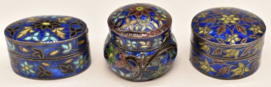 Three silver and enamel pill or similar pots, one marked 925 to base, length of longest 3cm