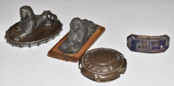 Two Armstrong Siddeley sphinx car mascots, blue enamel name badge and a hub cap or similar, diameter