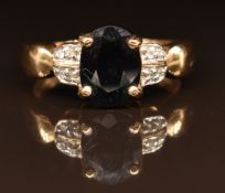 A 9k gold ring set with sapphire and diamonds, 3.3g, size M