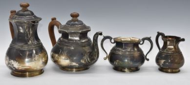 George V hallmarked silver four piece teaset comprising hot water jug, teapot, sugar bowl and milk