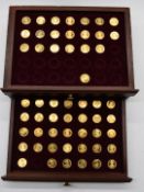 'Our Royal Sovereigns' collection of fifty six coins from Danbury Mint, in wooden collector's