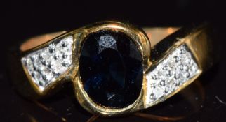 A 9k gold ring set with Shangdona sapphire and diamonds, 4.4g, size N