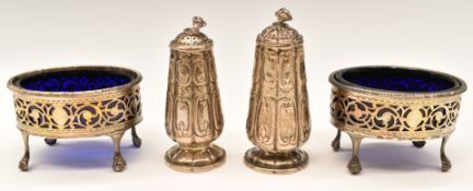Pair of Georgian hallmarked silver open salts with pierced decoration and blue glass liners,
