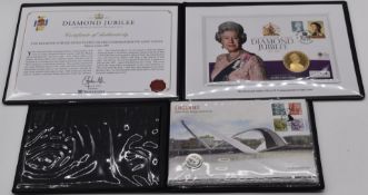 Two Westminster folders, one containing UK silver round pound and stamp covers, the other a gold