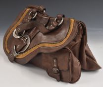 A vintage Christian Dior leather ladies bag with metal buckles in the form of stirrups