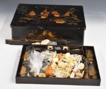 Japanese lacquer sewing box with bone, mother of pearl and similar accessories including bobbins,