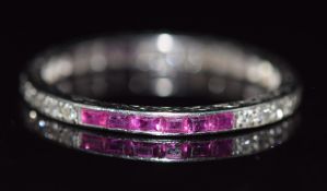 Art Deco platinum ring set with square cut rubies and round cut diamonds, with decoration engraved