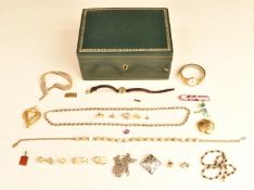 A collection of jewellery including a silver enamel set brooch, silver rope twist necklace, silver