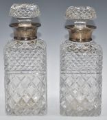 Pair of hallmarked silver mounted cut glass decanters, London 1961 and 1942, maker Roberts and