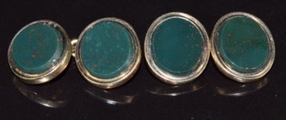 A pair of 9ct gold cufflinks set with bloodstone, 9.4g