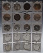 A collection of twenty various Canada silver Dollars in an album page, 1935-1971