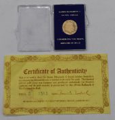 Queen Elizabeth II 9ct gold Royal Jubilee medallion coin, in case with certificate D1513, 2.5g