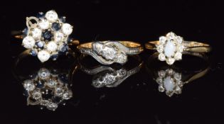 An 18ct gold ring set with three diamonds in a platinum twist setting (2.5g, size L) and two 9ct