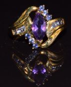 A 9k gold ring set with an amethyst and iolite, 4g, size N