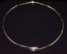A 14k gold necklace set with three round cut diamonds each approximately 0.25ct, 19.4g