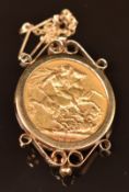 1880 gold full sovereign with Melbourne mint mark, in 9ct gold brooch mount, 10.8g