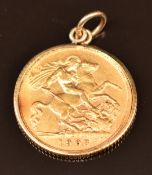 A 1908 gold half sovereign in 9ct gold mount, 4.6g