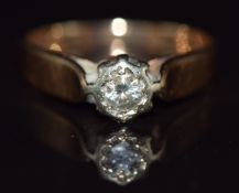 A 9ct gold ring set with a diamond in an illusion setting, 2.2g, size M