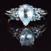 A 9k white gold ring set with a pear cut aquamarine and topaz, 2.7g, size Q
