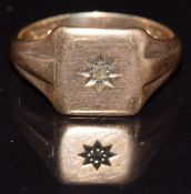 A 9ct gold signet ring set with a diamond in star setting, 4.2g, size U