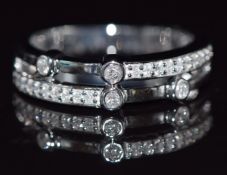 A 9k white gold ring set with diamonds, 3.9g, size M