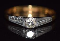 An 18ct gold ring set with a round cut diamond of approximately 0.15ct in a platinum mount, 3.2g,