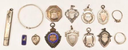 Hallmarked silver items comprising pair of napkin rings, buckle bangle, pot lid and a tennis