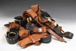 Small collection of leather and other belts together with some unfinished examples and leather