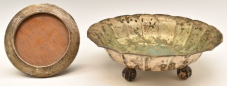 Continental white metal bowl with wrythen decoration, raised on four ball feet, with 800 grade,