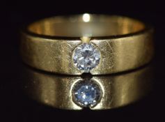 An 18k gold ring set with a round cut diamond of approximately 0.55ct, 8.8g, size  V