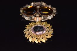 Two pinchbeck brooches set with paste, largest 4.5 x 2.6cm