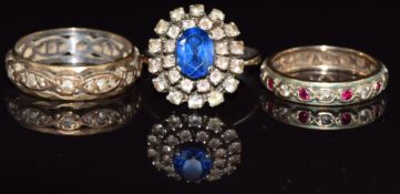 Two 9ct gold eternity rings (5.3g) and a paste ring