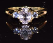 A 9k gold ring set with an oval cut kunzite and tanzanite, 3.3g, size Q