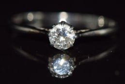 An 18ct white gold ring set with a round cut diamond of approximately 0.35ct, 1.6g, size S