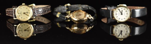 Three 9ct gold ladies wristwatches Sovereign, Avia and Rotary, all on leather straps.