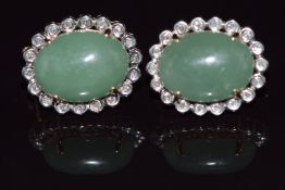 A pair of 9k gold earrings set with jade and diamonds, 8g