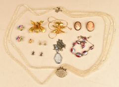 A collection of costume jewellery including Art Deco necklace, silver earrings set with paste,