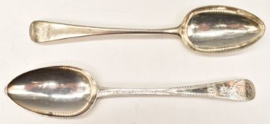 Two Bateman hallmarked silver Old English pattern table spoons, one with bright cut decoration,