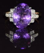 Art Deco 18ct gold ring set with an oval cut amethyst and diamonds, 4.3g, size S