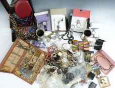 A large collection of costume jewellery including Tissot and other watches, earrings, beads,