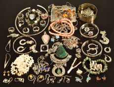 A collection of silver jewellery including, Chinese bangles, earrings, rope twist chain, pearl