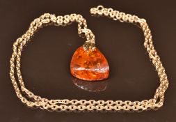 A 9ct gold necklace/ chain (28.3g) and 9ct gold pendant set with pressed amber