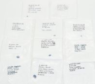 Thirty four loose white sapphires, three loose kyanite, three alexandrite and one loose Danburite