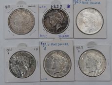 Six USA silver Dollars comprising a 1921 Morgan and five Peace examples, 1922, 1923, 1926, 1927