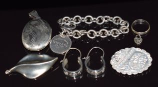 A silver bracelet, brooch, earrings and ring marked Tiffany and Co, silver locket and Victorian