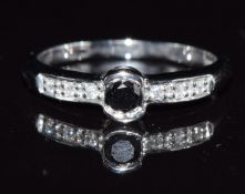 A 9k white gold ring set with black and white diamonds, 2.2g, size M